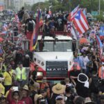 Decenas de miles de puertorriqueños piden la renuncia del gobernador Rosellós
